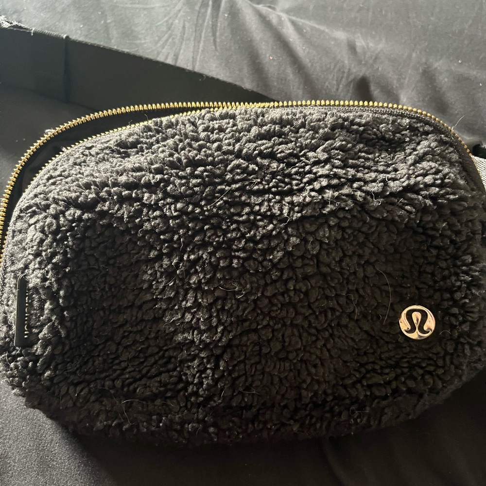 Lululemon Black sherpa Belt Bag with Gold Zipper, used handful of times